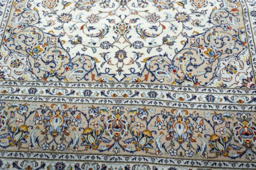Close-up detail of 2000s Kashan rug from Iran / Persia showing Wool weave