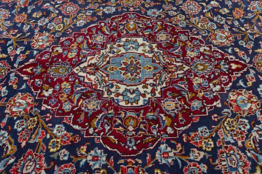 Central medallion detail of 2000s Kashan rug from Iran / Persia