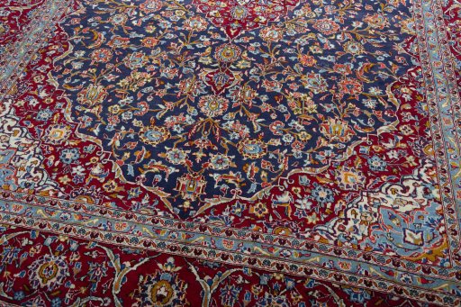 Close-up detail of 2000s Kashan rug from Iran / Persia showing Wool weave