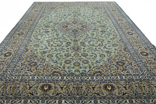 Surface texture of 2000s Kashan rug with natural Wool and intricate pattern