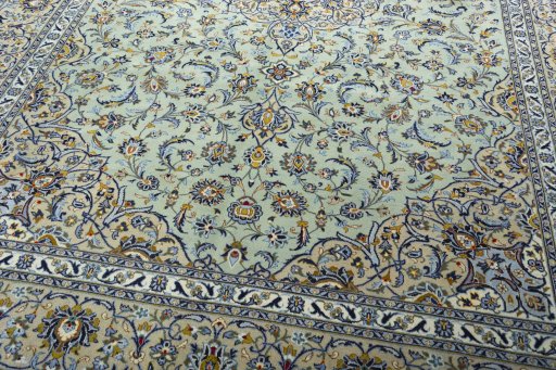 Close-up detail of 2000s Kashan rug from Iran / Persia showing Wool weave