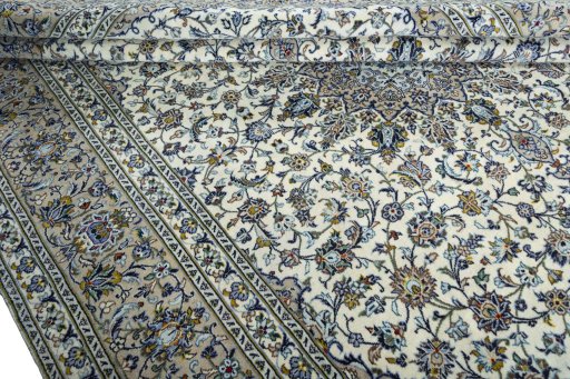 Close-up detail of 2000s Kashan rug from Iran / Persia showing Wool weave
