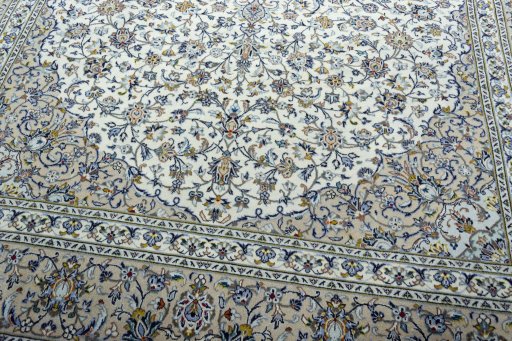 Close-up detail of 2000s Kashan rug from Iran / Persia showing Wool weave