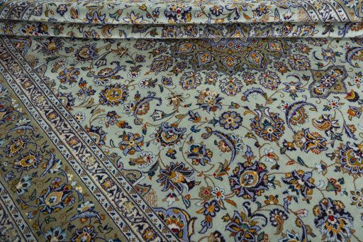 Close-up detail of 2000s Kashan rug from Iran / Persia showing Wool weave