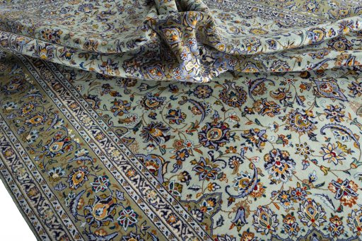 Surface texture of 2000s Kashan rug with natural Wool and intricate pattern
