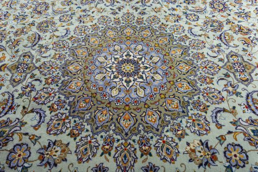 Central medallion detail of 2000s Kashan rug from Iran / Persia