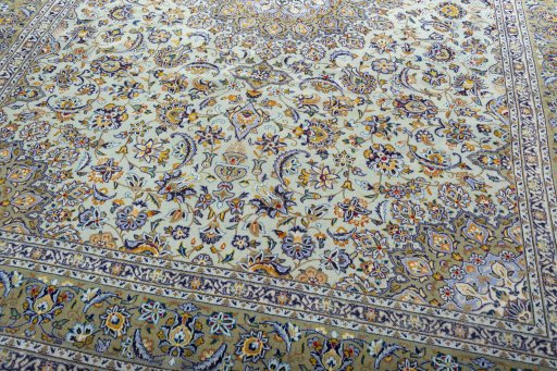 Close-up detail of 2000s Kashan rug from Iran / Persia showing Wool weave