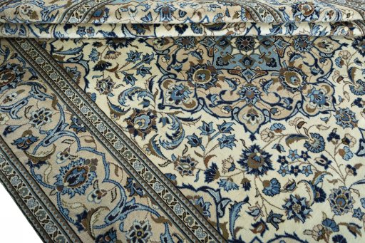 Close-up detail of 2000s Kashan rug from Iran / Persia showing Wool weave