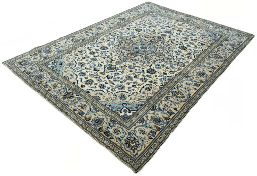 Corner detail of 2000s Kashan rug showing border pattern and Wool pile