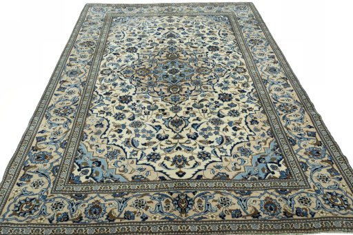 Surface texture of 2000s Kashan rug with natural Wool and intricate pattern