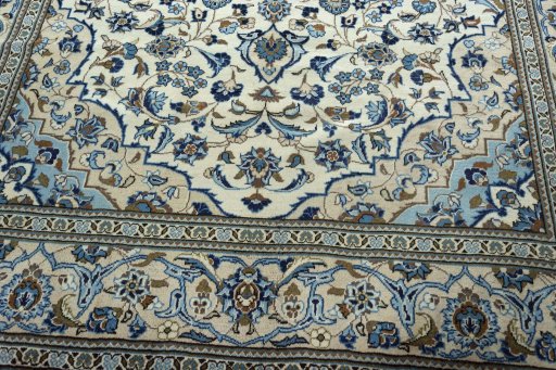 Close-up detail of 2000s Kashan rug from Iran / Persia showing Wool weave