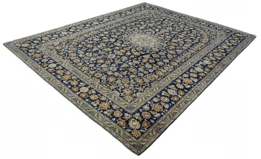Corner detail of 2000s Kashan rug showing border pattern and Wool pile