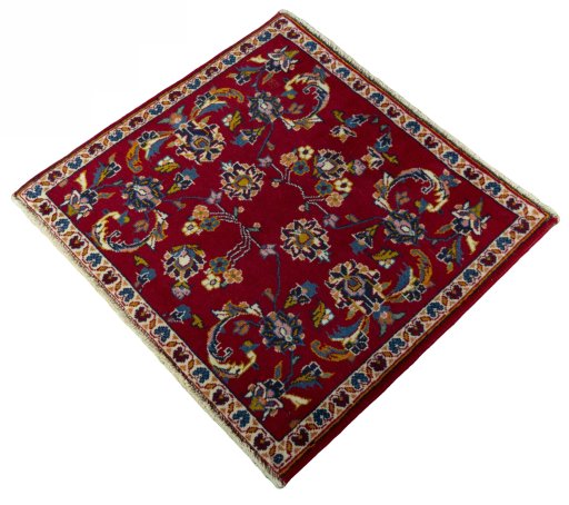 Corner detail of 2000s Kashan rug showing border pattern and Wool pile