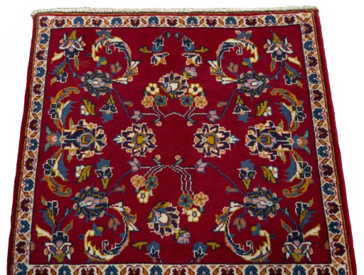 Surface texture of 2000s Kashan rug with natural Wool and intricate pattern