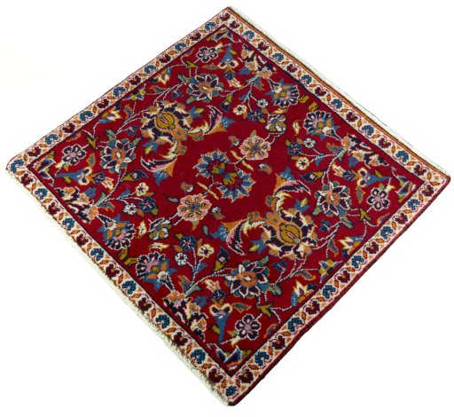 Corner detail of 2000s Kashan rug showing border pattern and Wool pile