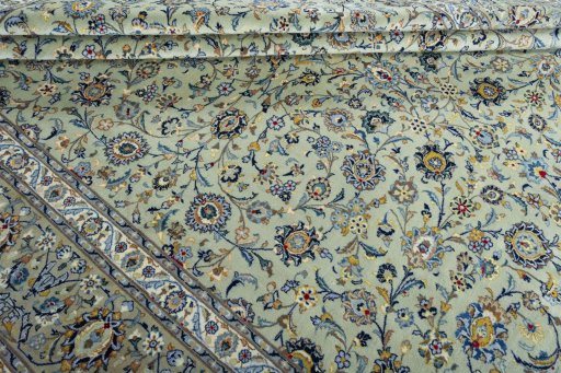 Close-up detail of 2000s Kashan rug from Iran / Persia showing Wool weave