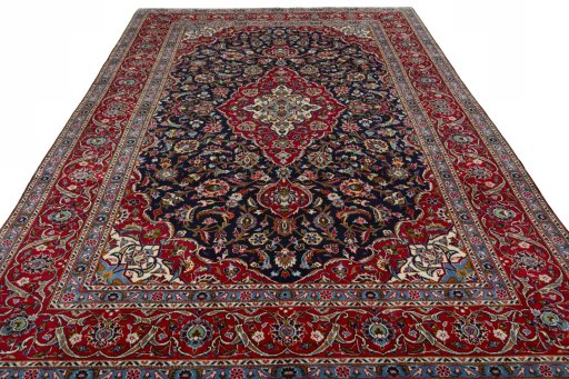 Surface texture of 2000s Kashan rug with natural Wool and intricate pattern