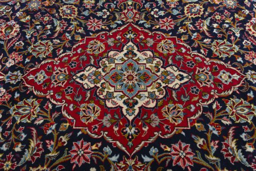 Central medallion detail of 2000s Kashan rug from Iran / Persia