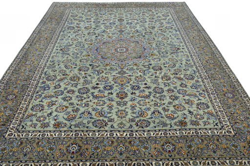 Surface texture of 2000s Kashan rug with natural Wool and intricate pattern