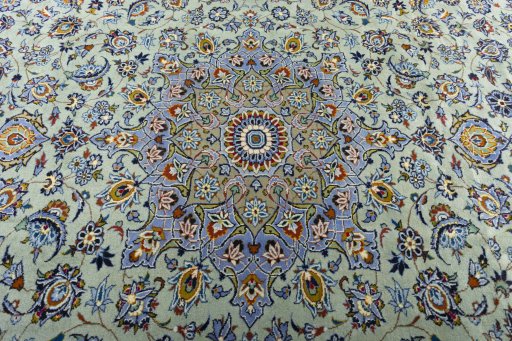 Central medallion detail of 2000s Kashan rug from Iran / Persia