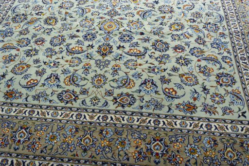 Close-up detail of 2000s Kashan rug from Iran / Persia showing Wool weave