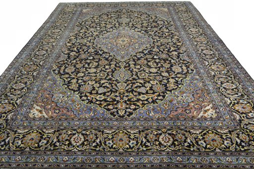 Surface texture of 2000s Kashan rug with natural Wool and intricate pattern