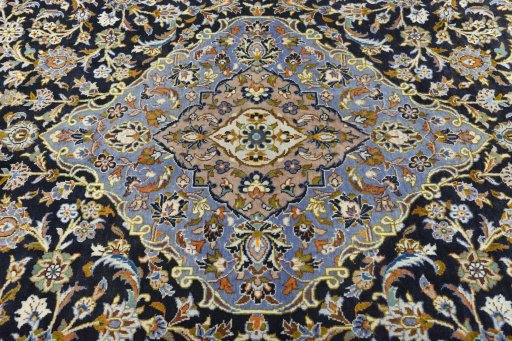 Central medallion detail of 2000s Kashan rug from Iran / Persia