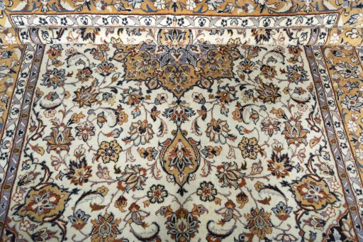 Close-up detail of 2000s Kashan rug from Iran / Persia showing Wool weave