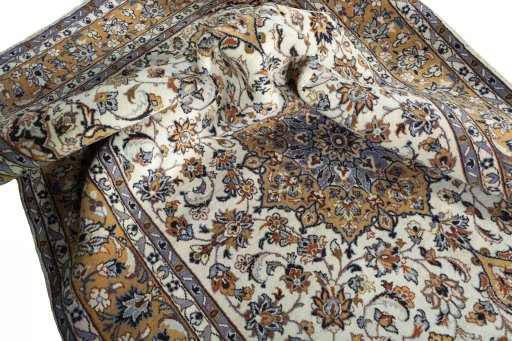 Surface texture of 2000s Kashan rug with natural Wool and intricate pattern