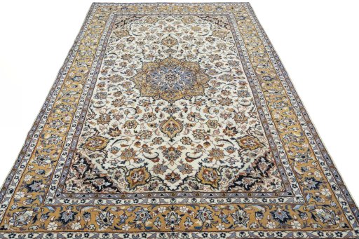 Surface texture of 2000s Kashan rug with natural Wool and intricate pattern