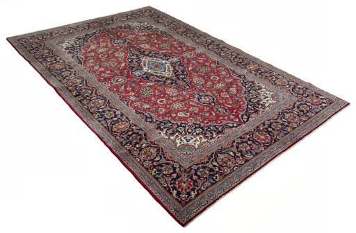 Close-up detail of 2000s Kashan rug from Iran / Persia showing Wool weave