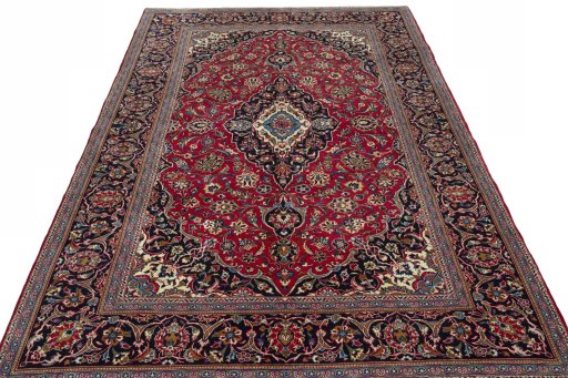 Surface texture of 2000s Kashan rug with natural Wool and intricate pattern
