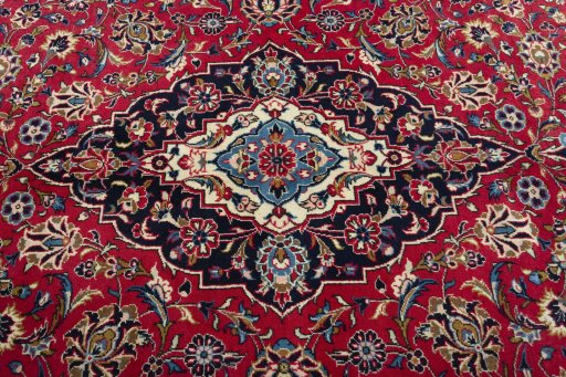 Central medallion detail of 2000s Kashan rug from Iran / Persia