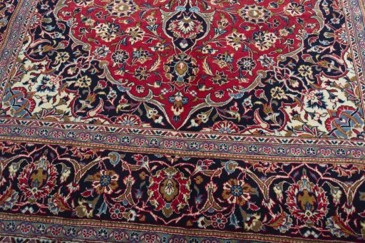 Close-up detail of 2000s Kashan rug from Iran / Persia showing Wool weave