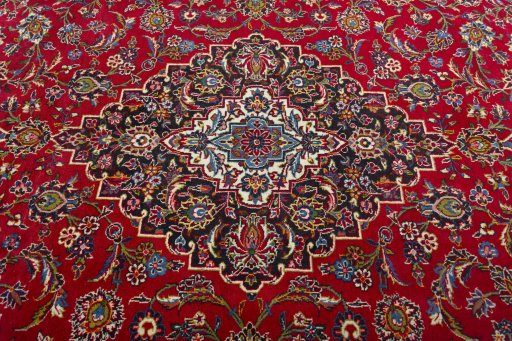 Central medallion detail of 2000s Kashan rug from Iran / Persia