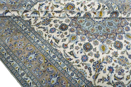 Close-up detail of 2000s Kashan rug from Iran / Persia showing Wool weave