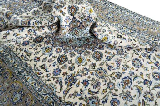 Surface texture of 2000s Kashan rug with natural Wool and intricate pattern