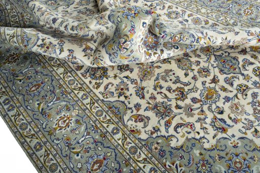Surface texture of 2000s Kashan rug with natural Wool and intricate pattern