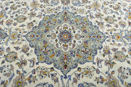 Central medallion detail of 2000s Kashan rug from Iran / Persia