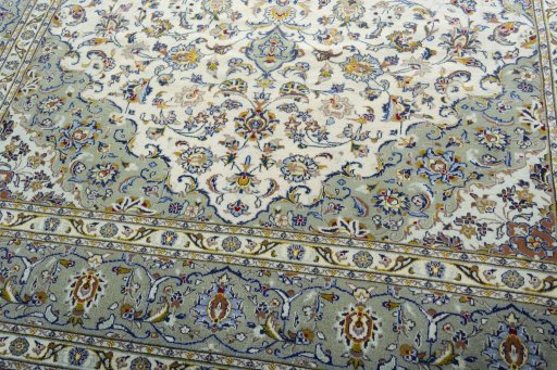 Close-up detail of 2000s Kashan rug from Iran / Persia showing Wool weave