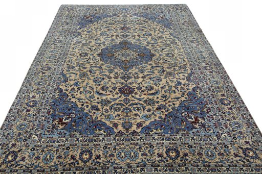 Surface texture of 2000s Kashan rug with natural Wool and intricate pattern