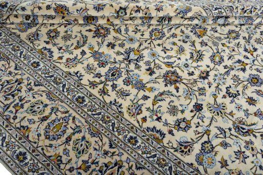 Close-up detail of 2000s Kashan rug from Iran / Persia showing Wool weave
