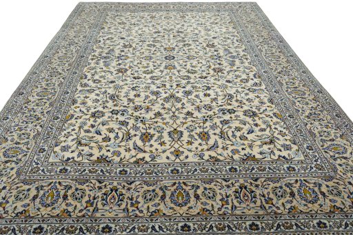 Surface texture of 2000s Kashan rug with natural Wool and intricate pattern