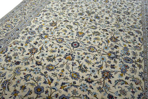 Backside of handmade 2000s Kashan rug showing knot structure and weave density