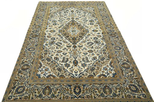 Surface texture of 2000s Kashan rug with natural Wool and intricate pattern