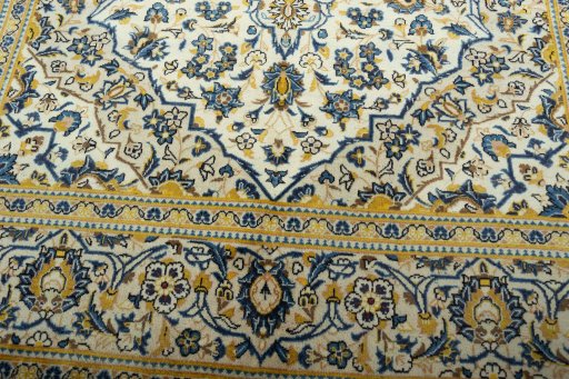 Close-up detail of 2000s Kashan rug from Iran / Persia showing Wool weave