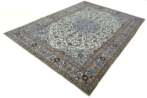 Corner detail of 2000s Kashan rug showing border pattern and Wool pile