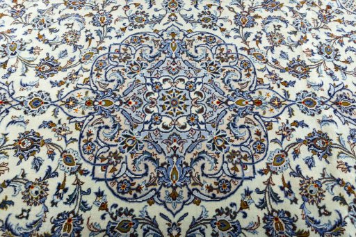 Central medallion detail of 2000s Kashan rug from Iran / Persia