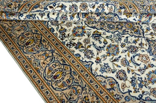 Close-up detail of 2000s Kashan rug from Iran / Persia showing Wool weave