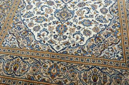 Close-up detail of 2000s Kashan rug from Iran / Persia showing Wool weave